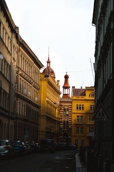 A captivating street view in Prague showcasing historic architectural designs and vibrant colors.