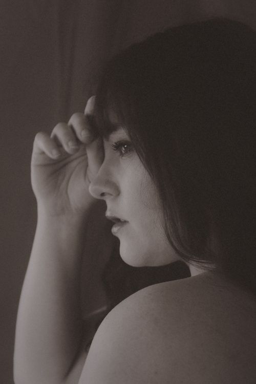 Sepia-Toned Emotional Portrait of a Young Woman · Free Stock Photo