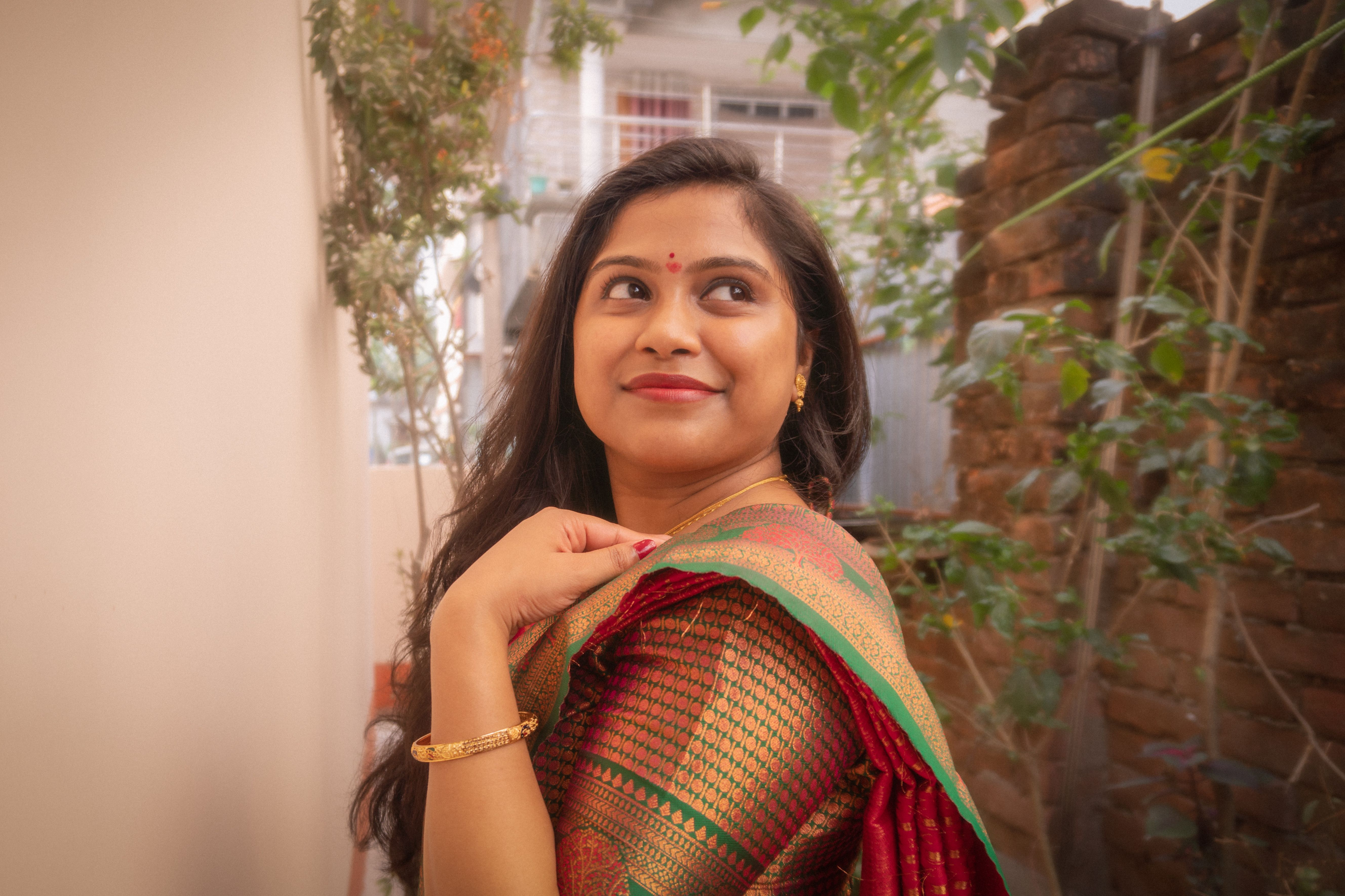 Elegant Woman in Traditional Indian Saree Outdoors · Free Stock Photo