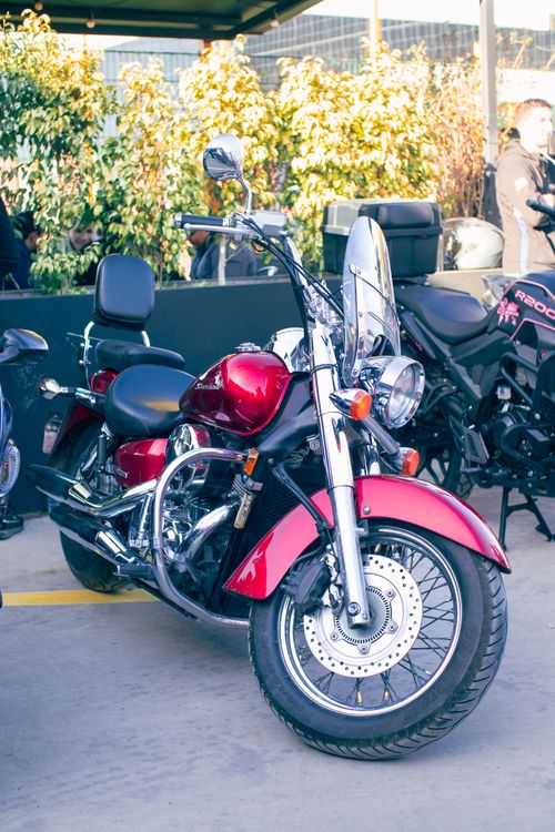 Motorcycle Ride Rv Red Classic Red Motorcycle in Outdoor Setting · Free Stock Photo