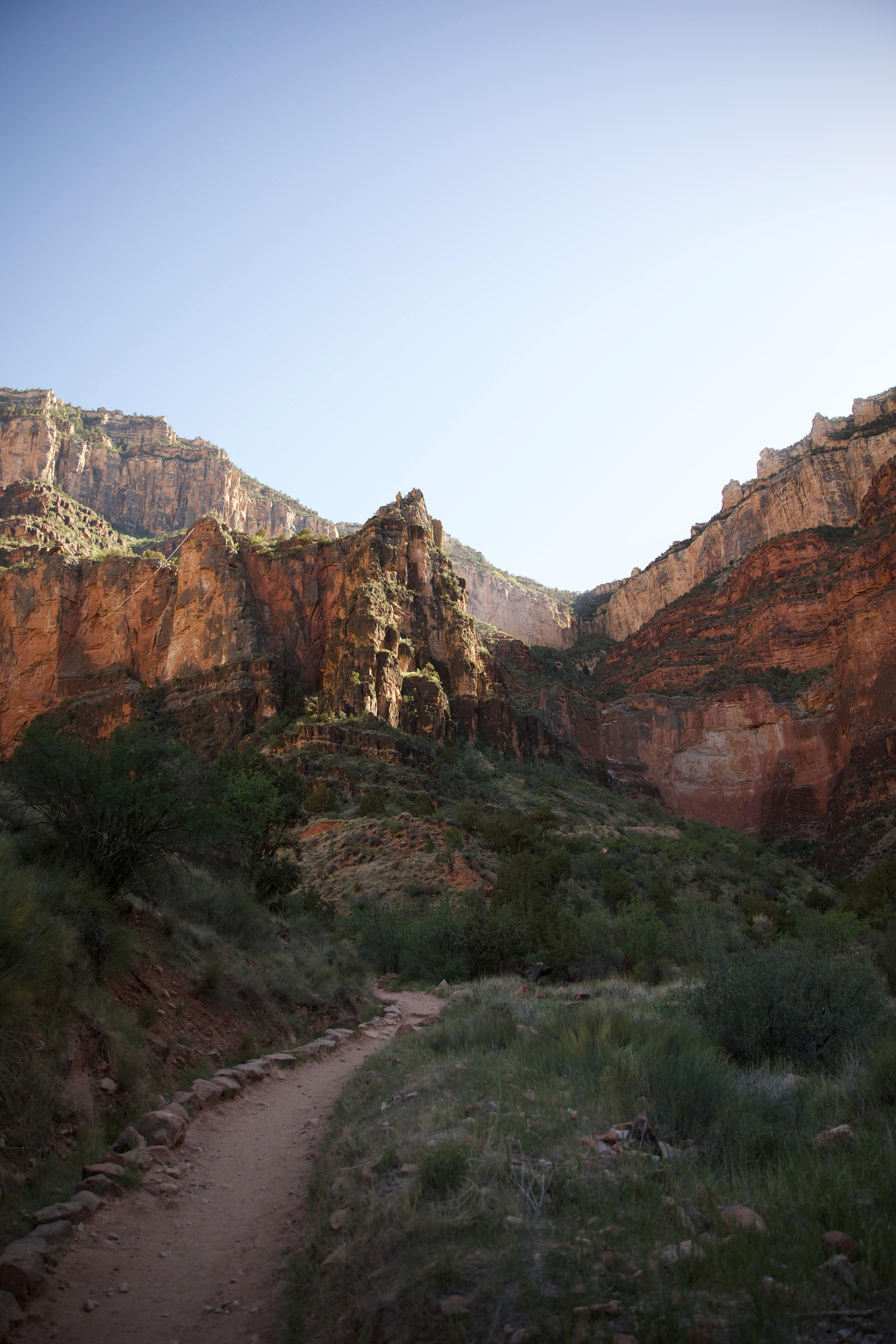 Stunning view of a hiking trail through the majestic Grand Canyon, perfect for nature enthusiasts.