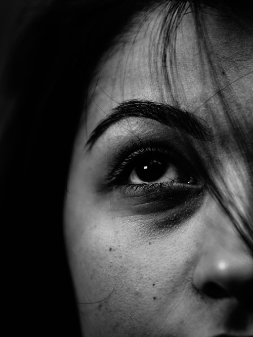 Free Dramatic black and white close-up of a woman's eye with expressive detail and intense gaze. Stock Photo