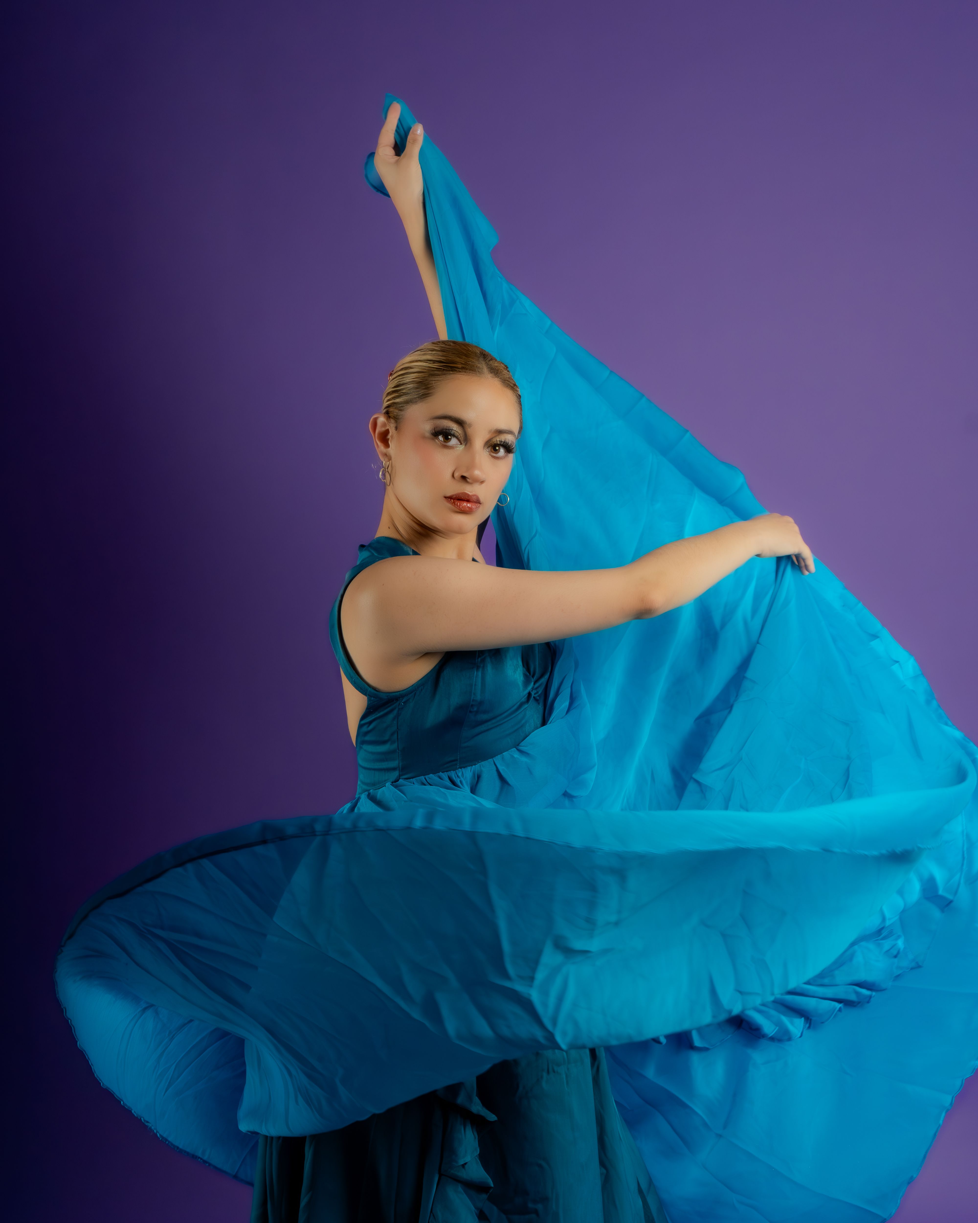 Elegant Ballerina in Flowing Blue Dress  Free Stock Photo