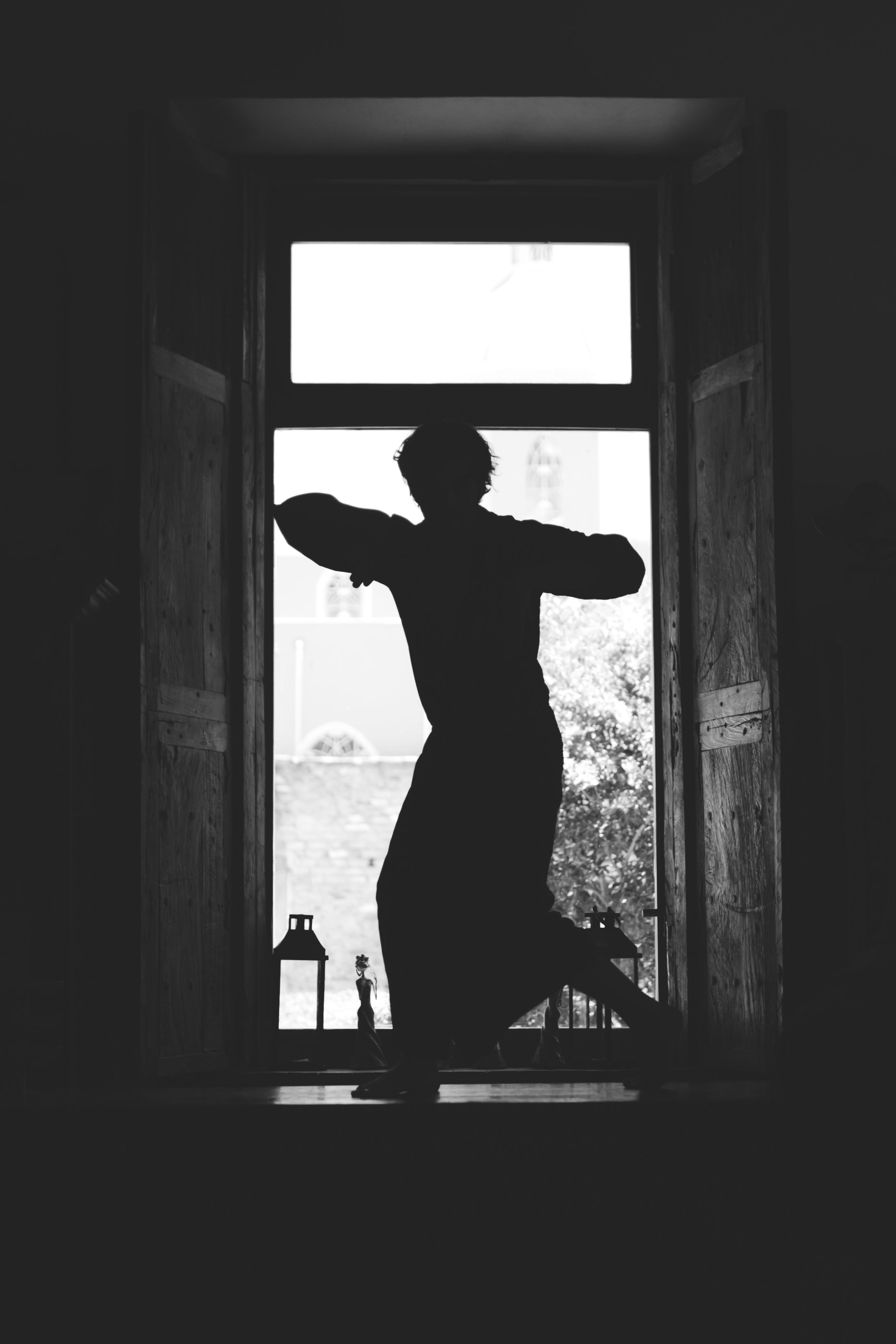 Silhouette of Person in Window Frame · Free Stock Photo
