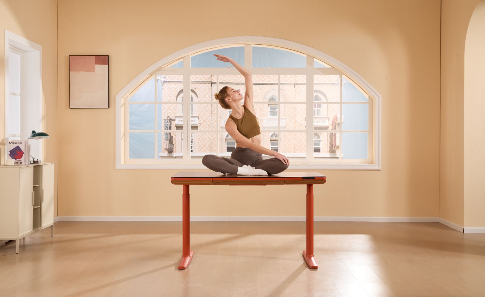 Woman practicing desk yoga stretch at her office desk between work tasks