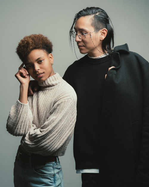 Free A fashionable portrait of two diverse adults in casual clothing posing confidently. Stock Photo
