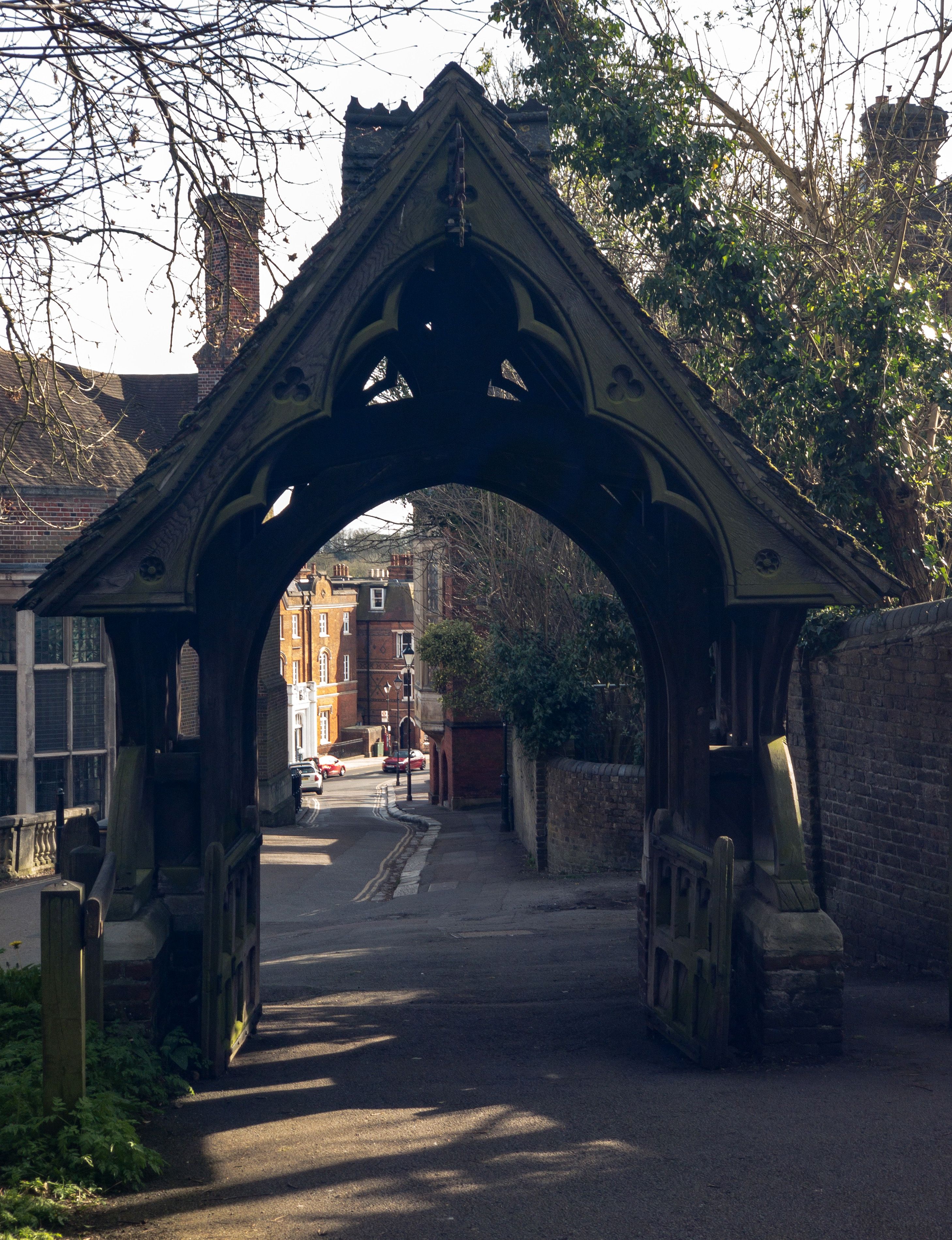 Historic lychgate of St Mary's Church in Harrow-on-the-Hill, showcasing classic architecture.
