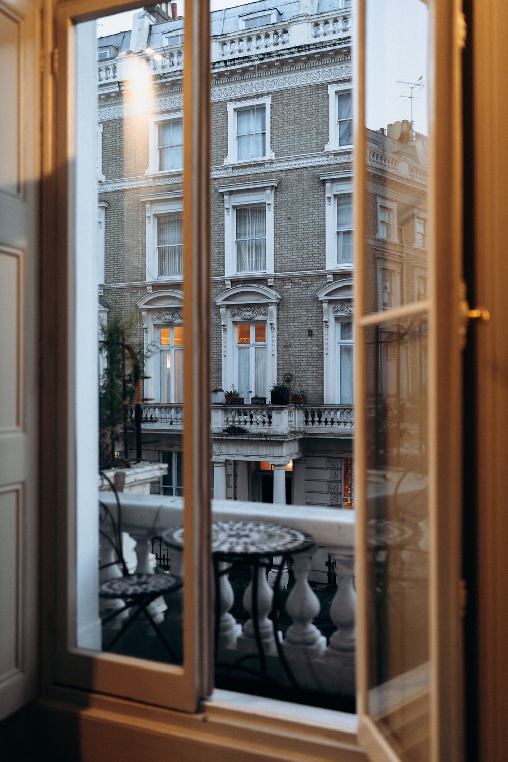 View Through Window Open Back View Through Window of Classic London Townhouse · Free Stock Photo