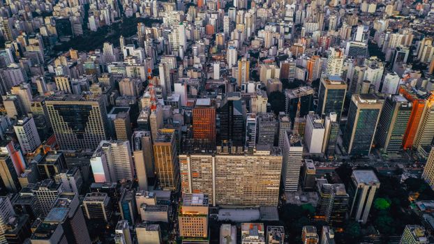 Aerial view of dense urban skyline in São Paulo, showcasing the city's dynamic architecture.