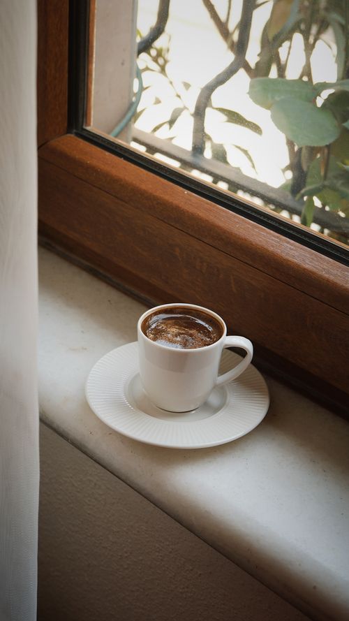 Free A serene Turkish coffee moment captured on a windowsill, ideal for cozy mornings. Stock Photo