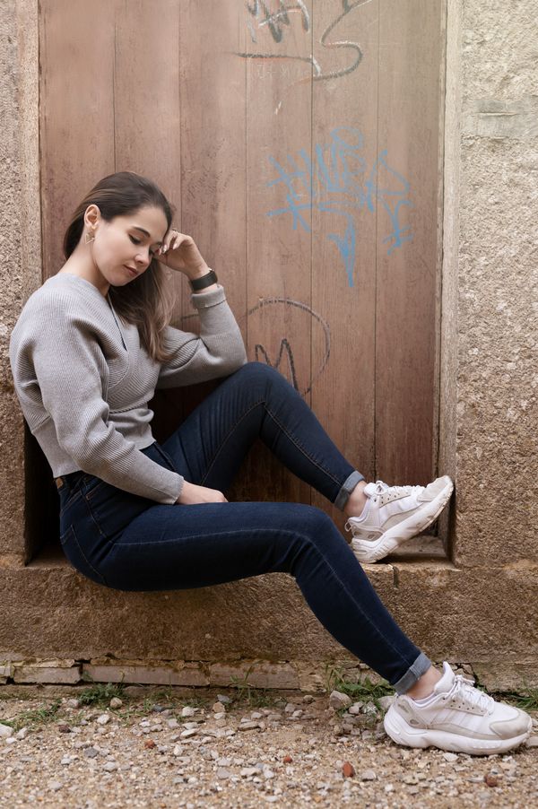Woman in casual jeans at church