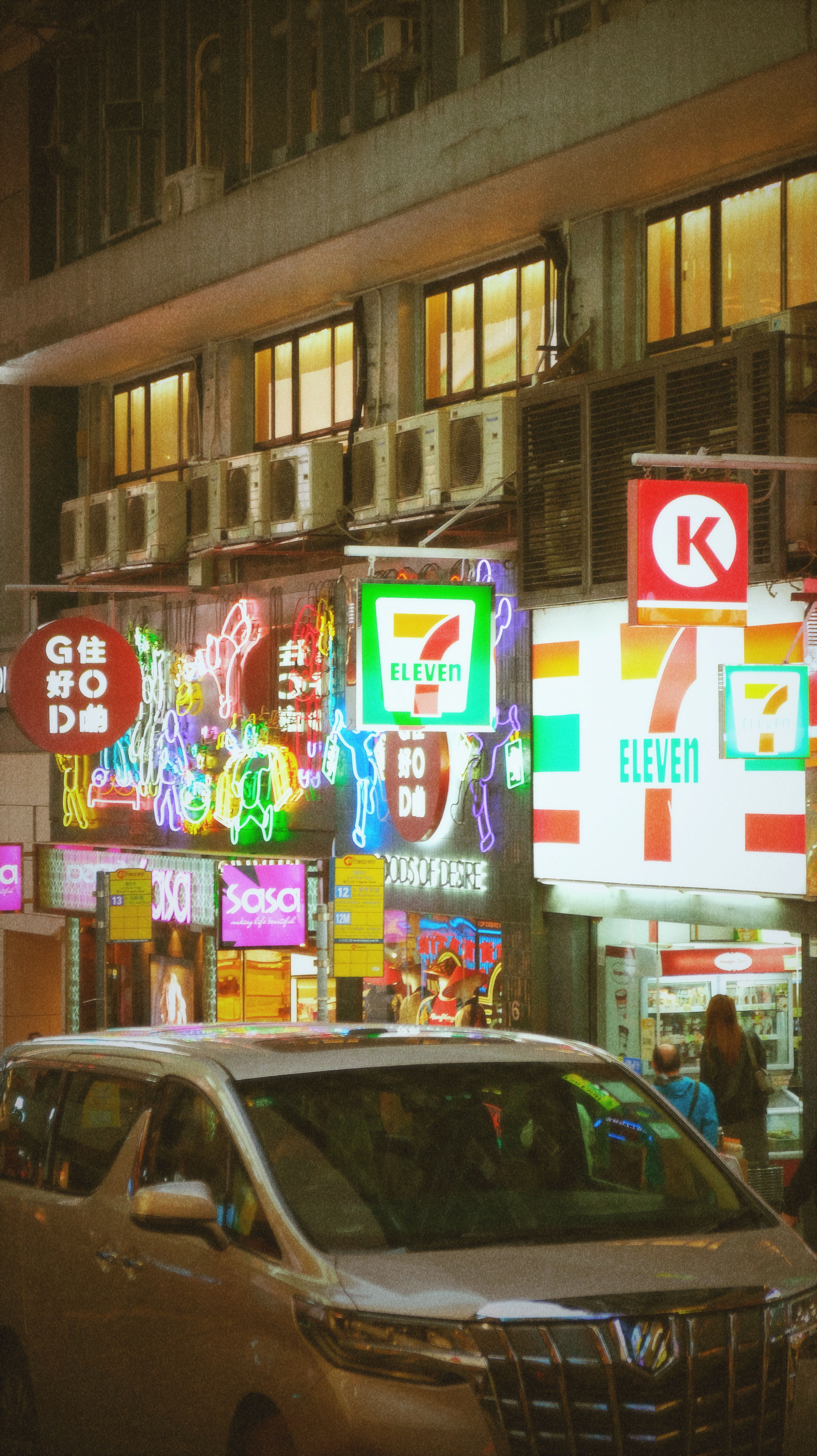 Vibrant Neon Streets of Urban Cityscape at Night · Free Stock Photo