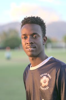 A young soccer player poses on the field during the Salad Bowl Festival in Los Angeles.