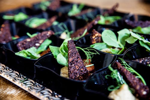 Grilled Meat on Black Ceramic Plate