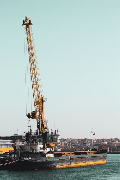 Black and Yellow Crane on Ship