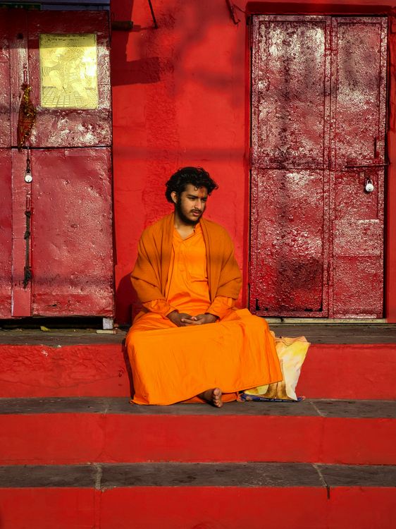 Monk Robe Sitting Meditative Monk Sitting in Varanasi · Free Stock Photo