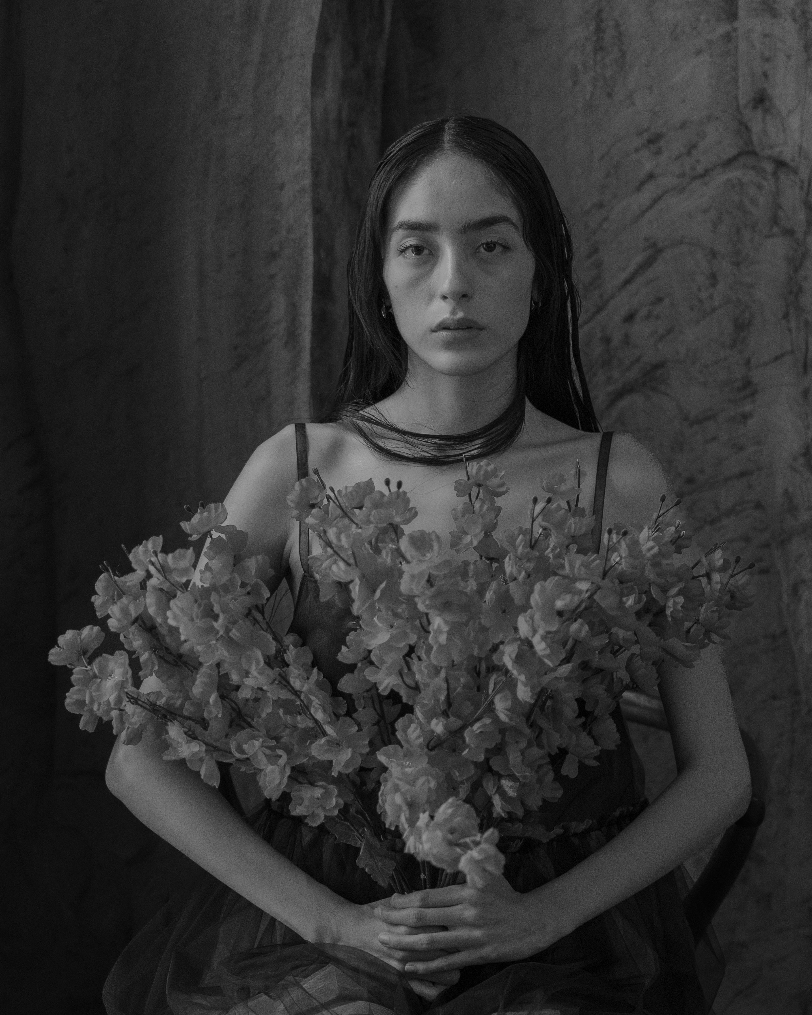 Dramatic Black and White Portrait with Flowers · Free Stock Photo