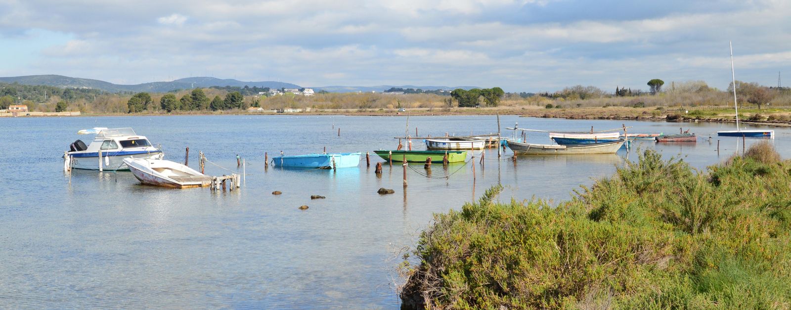 A peaceful scene of boats on Étang de Thau in Balaruc-le-Vieux, France.