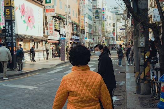 Vibrant street life in Seoul, South Korea, capturing daily hustle in a lively urban setting.