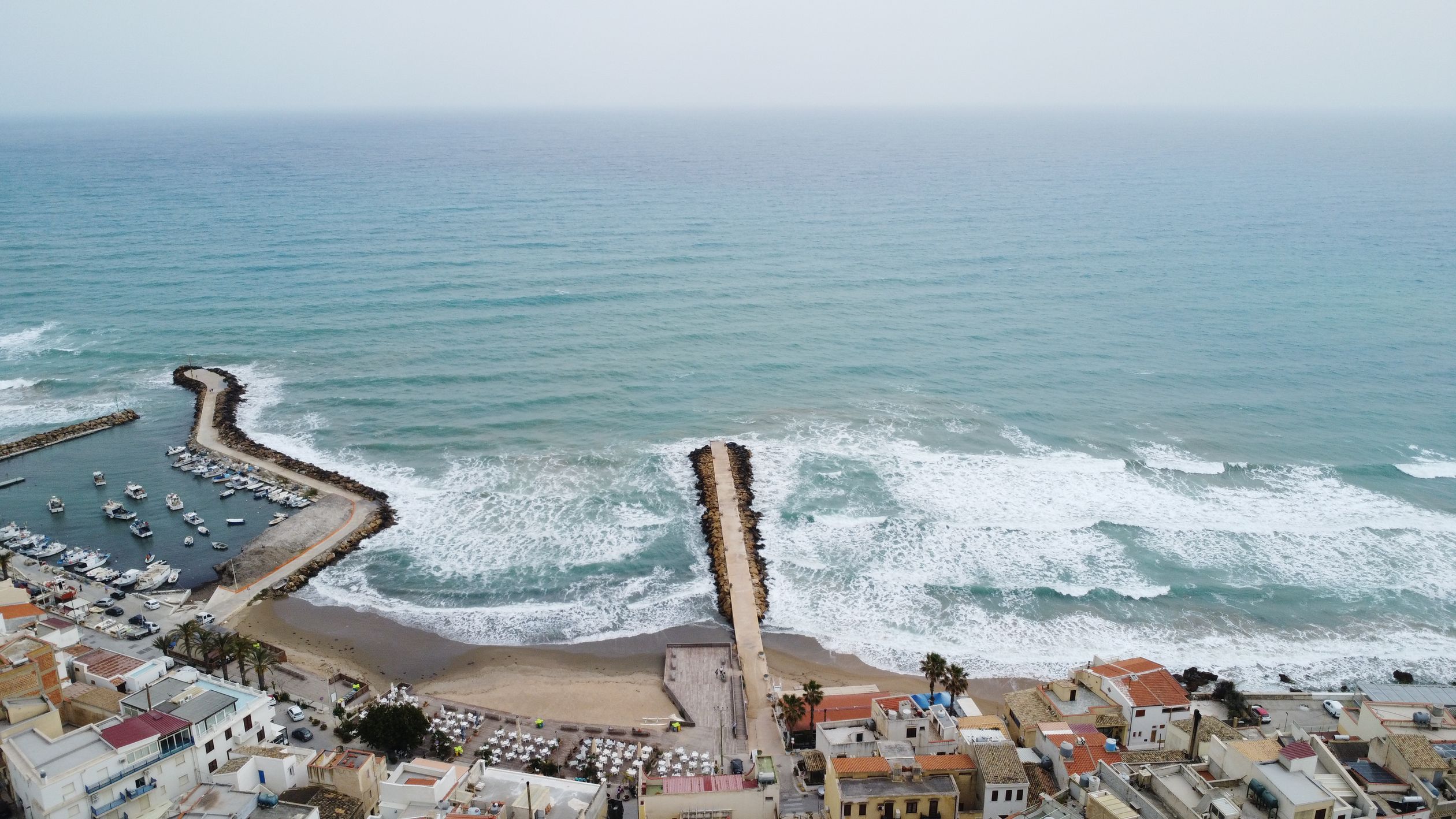 Aerial View of Mediterranean Coastal Town and Harbor · Free Stock Photo