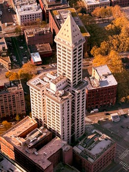 Aerial shot of Smith Tower in autumn, Seattle's iconic skyscraper.