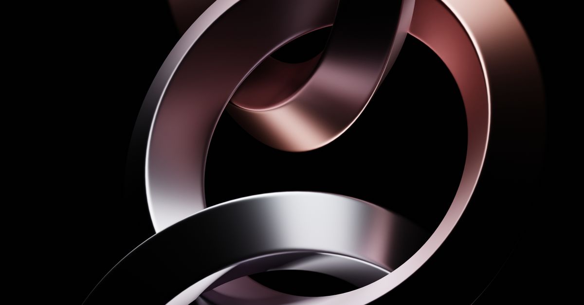 Metal Rings Background Elegant Metal Rings on Black Background · Free Stock Photo