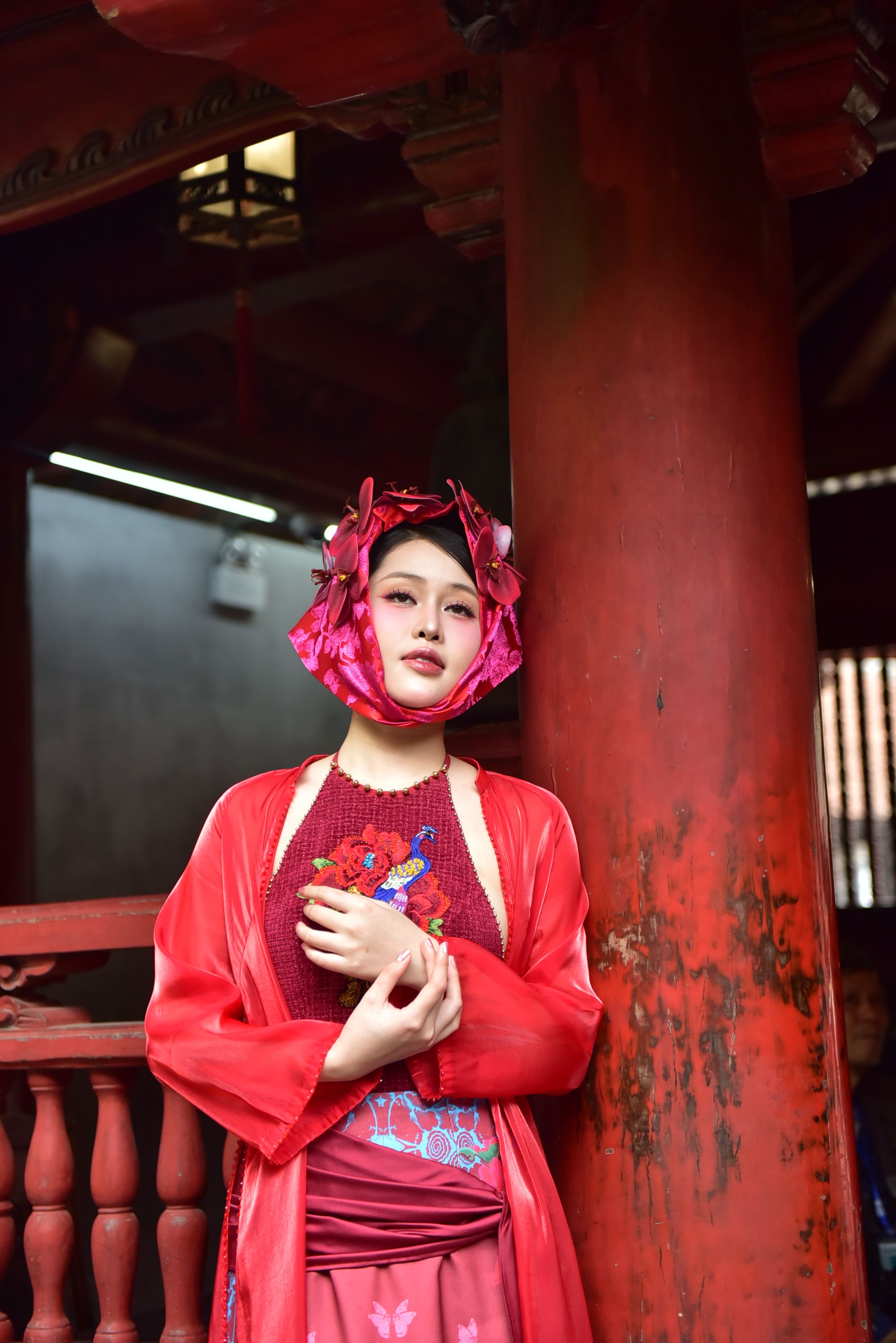 Elegant Woman in Traditional Red Attire Indoors · Free Stock Photo
