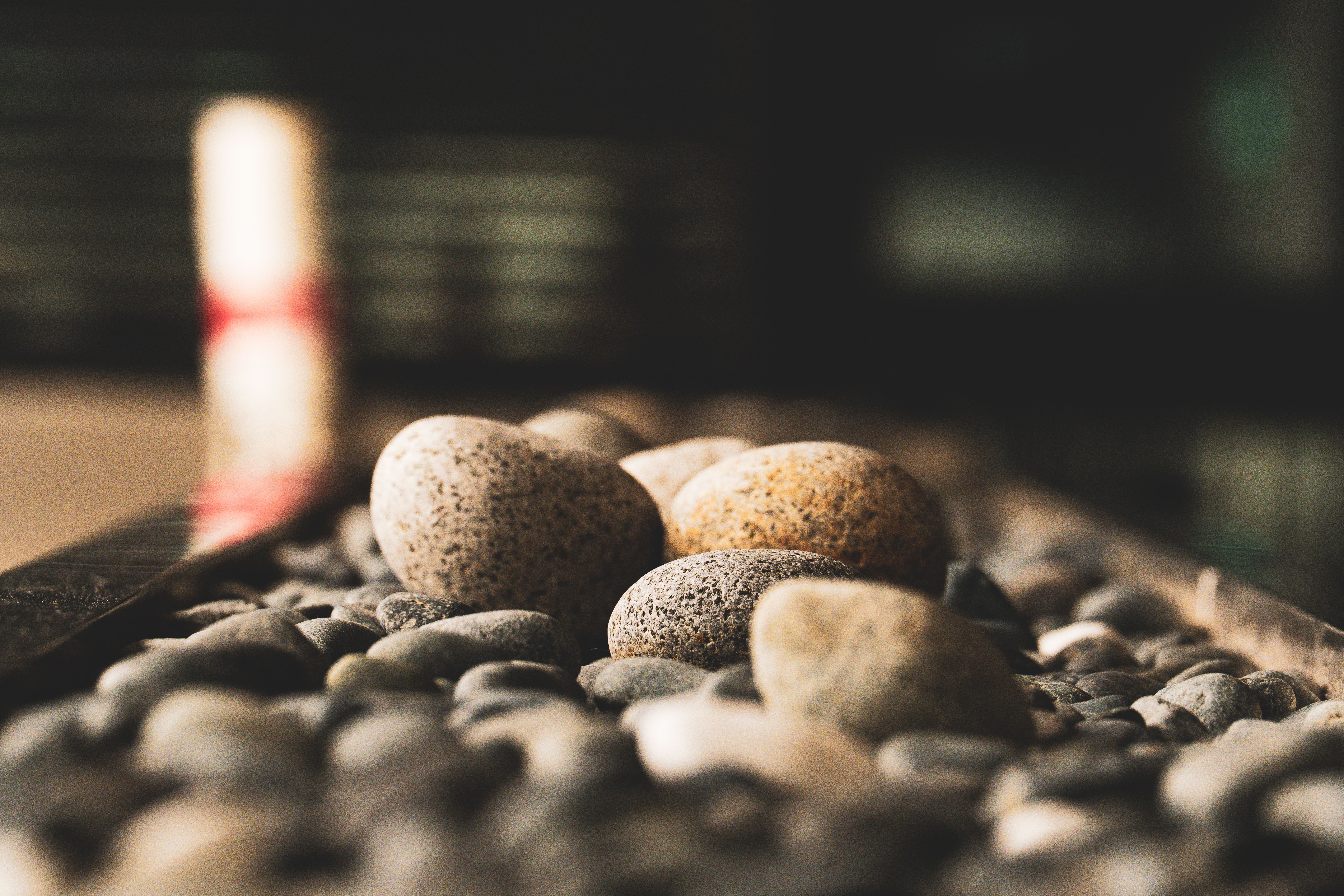 Close-Up of Smooth Pebbles in Artistic Display · Free Stock Photo