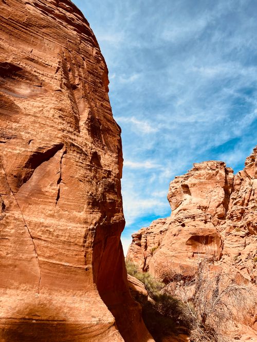 Free Explore the stunning sandstone formations of Antelope Canyon with vibrant blue skies overhead. Stock Photo