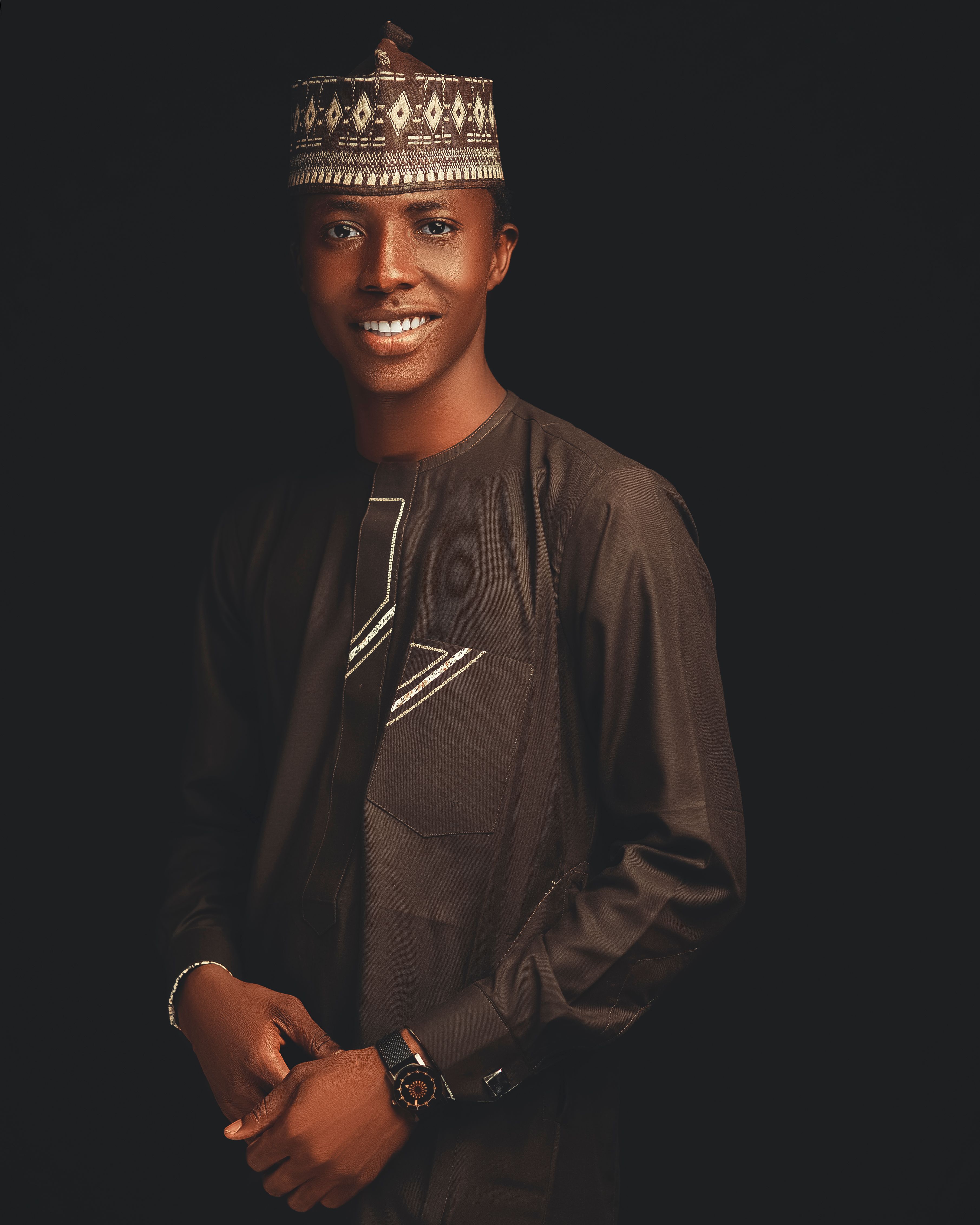 Elegant Portrait of Man in Traditional Attire · Free Stock Photo