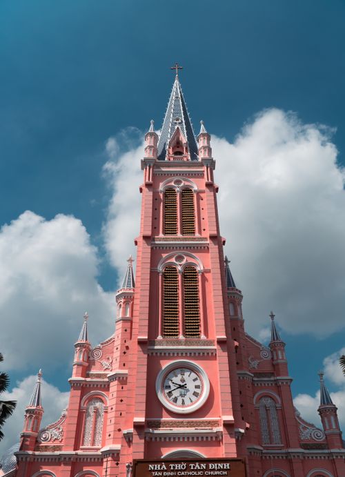 Free Stunning view of Tan Dinh Church against a bright blue sky in Ho Chi Minh City, Vietnam. Stock Photo