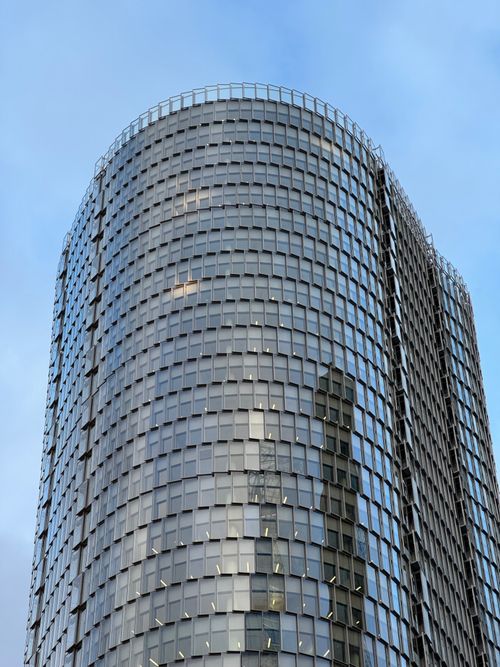 Free Tall glass skyscraper at La Défense, Paris, showcasing modern architecture. Stock Photo