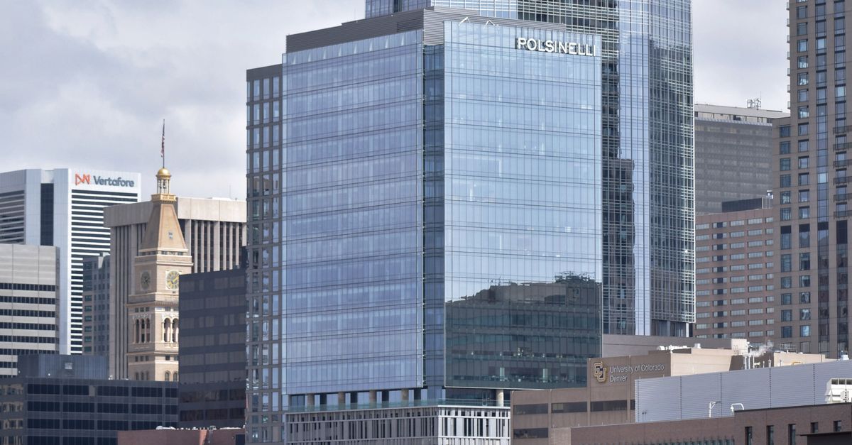 Optiv Building Cybertruck and Urban Skyline Panorama · Free Stock Photo