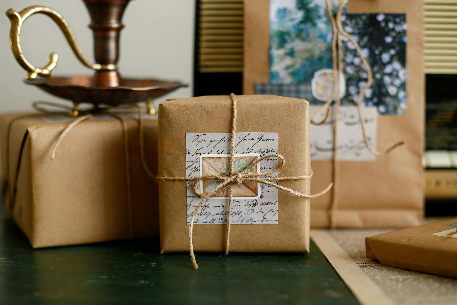 Beautifully wrapped gifts in brown paper and twine create a vintage aesthetic.