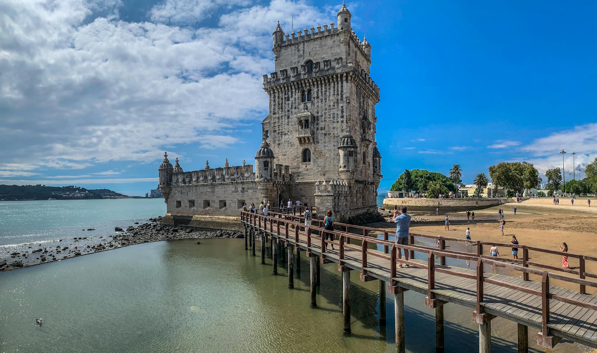 Explore the historic Belem Tower in Lisbon against a clear sky.