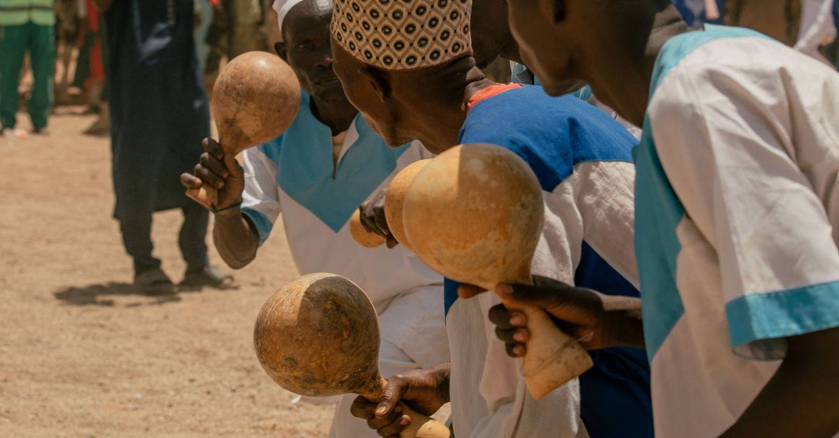 Traditional African Dance with Gourd Rattles · Free Stock Photo