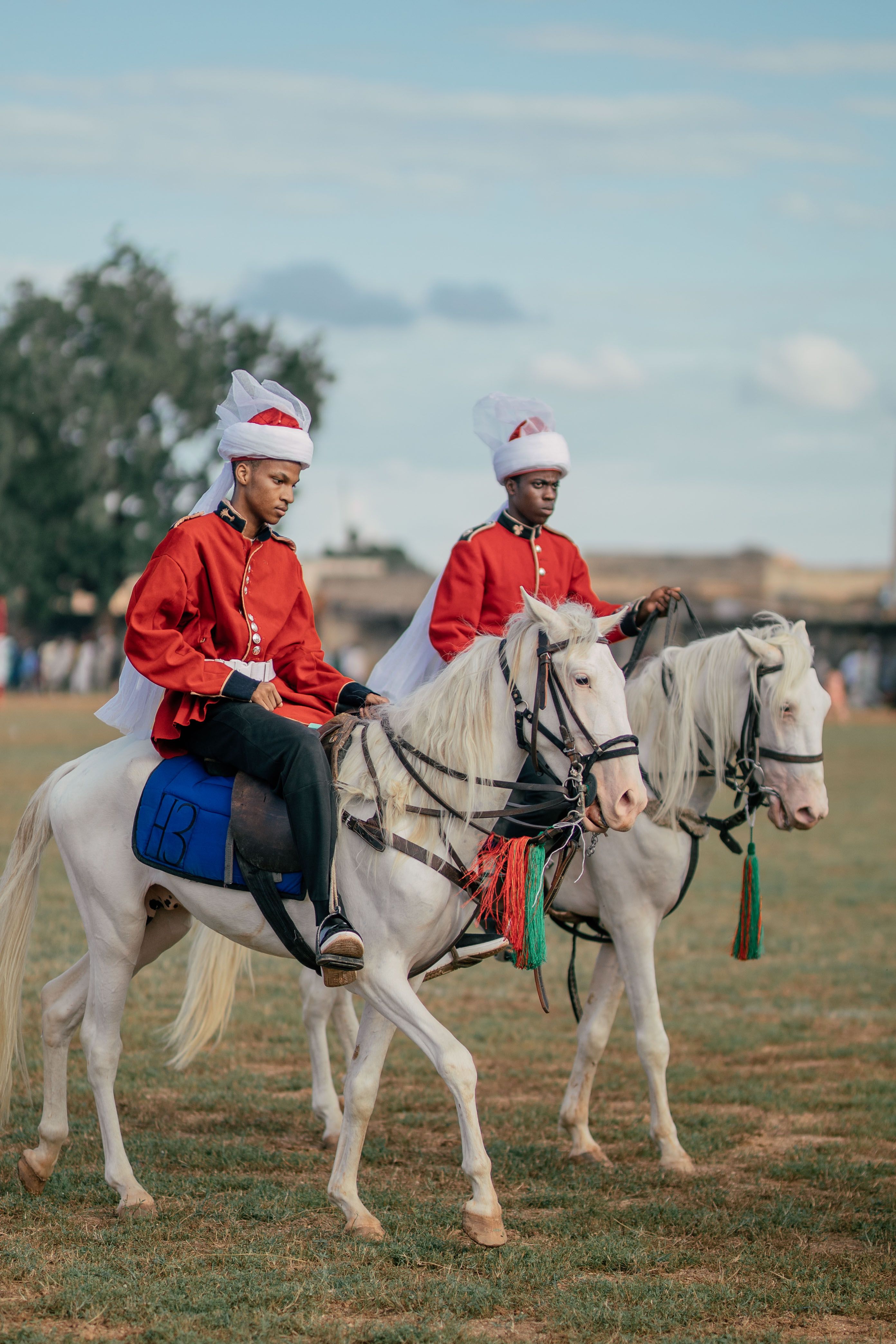 Traditional Horse Riders in Cultural Attire · Free Stock Photo