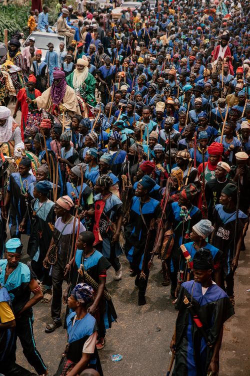 Free Colorful parade with participants in traditional attire celebrating cultural heritage. Stock Photo