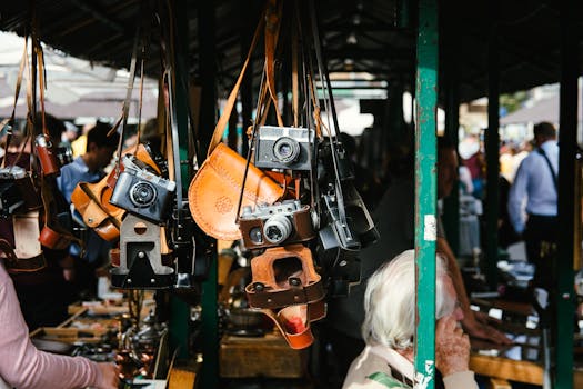Hanging vintage cameras at an outdoor market in Kraków, Poland.