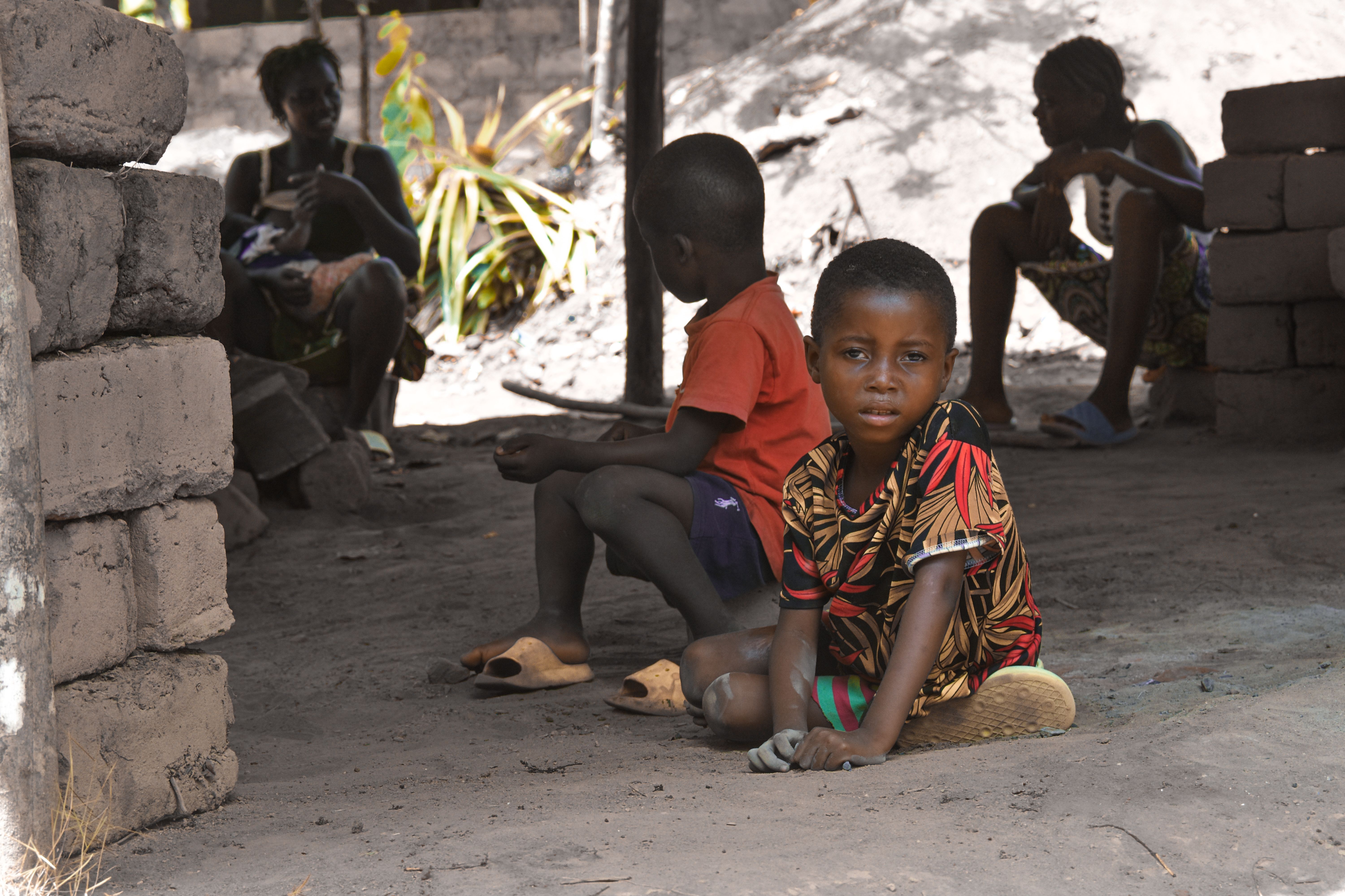 A candid moment of children at play in Monrovia, Liberia, capturing joyful outdoor scenes.