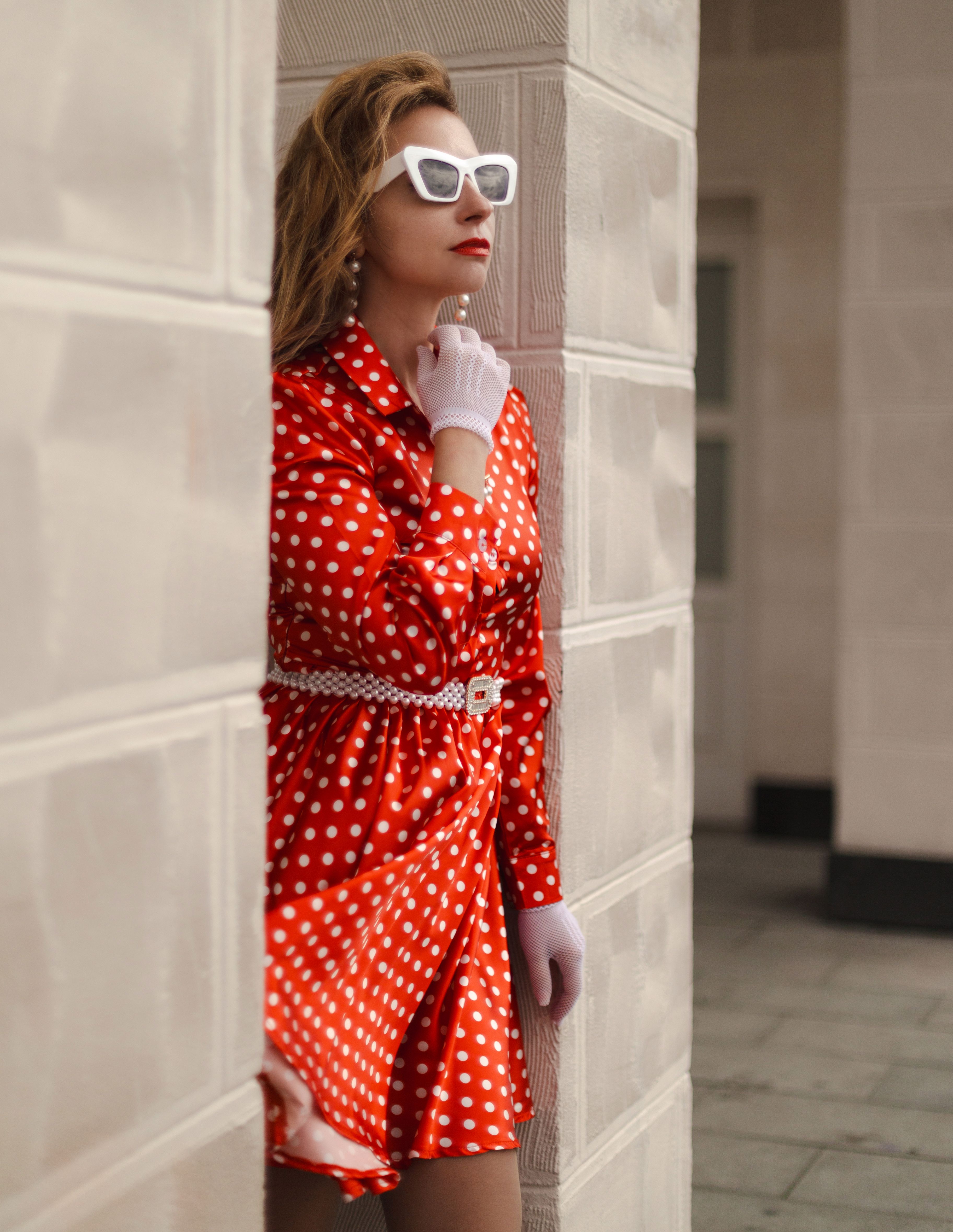 Fashionable woman in polka dot dress outdoors · Free Stock Photo