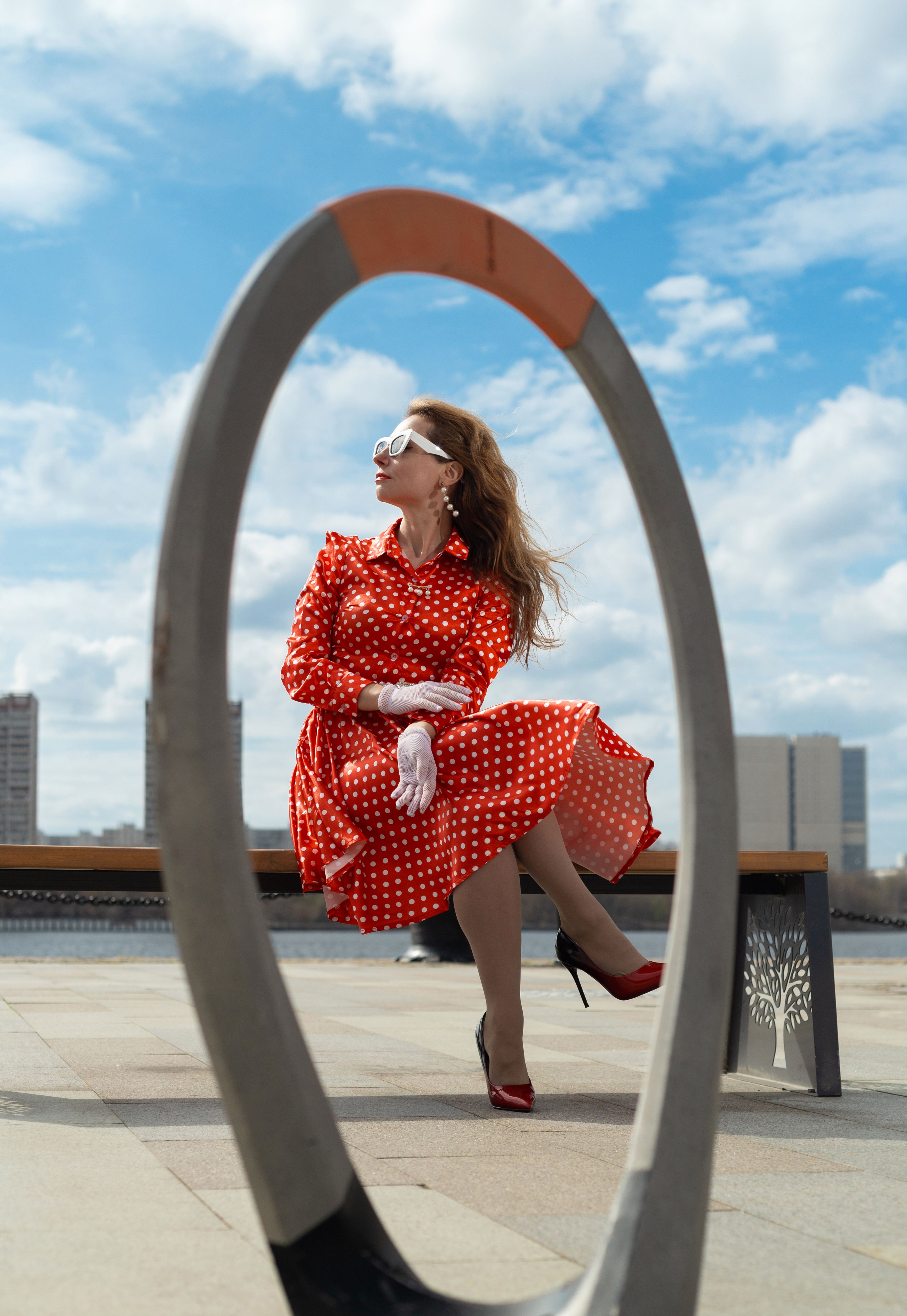 Woman in Red Polka Dot Dress Outdoors · Free Stock Photo