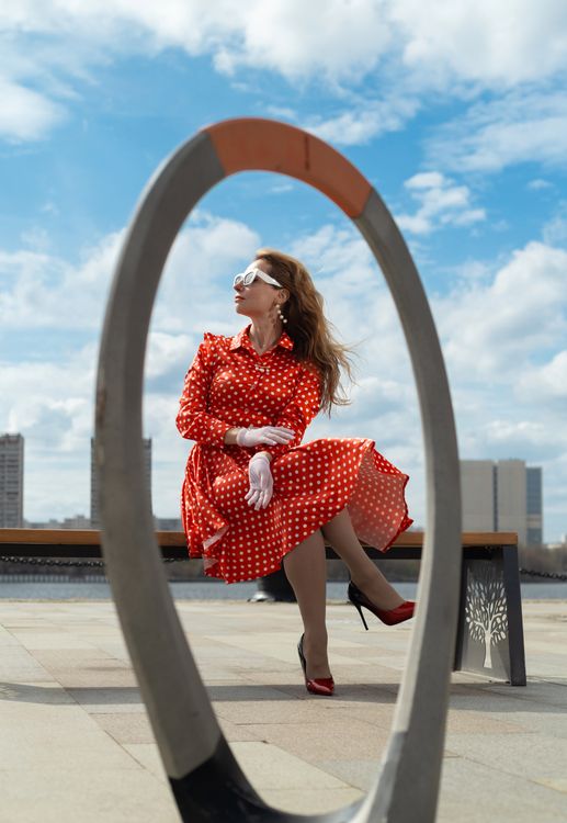 Woman in Red Polka Dot Dress Outdoors · Free Stock Photo