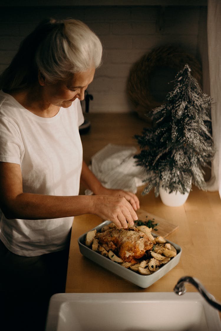 Woman Cooking Chicken