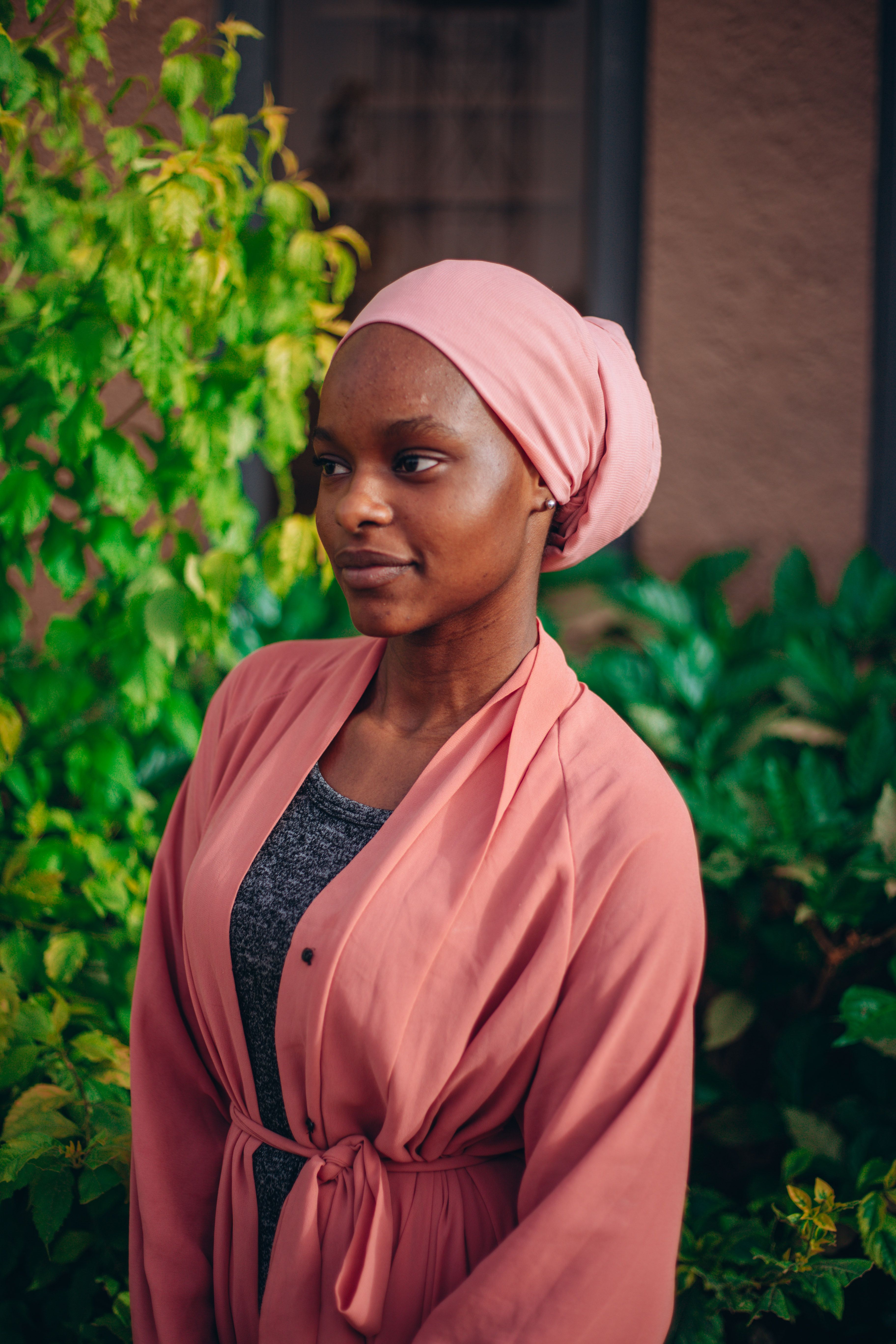 Portrait of Woman with Pink Headscarf Outdoors · Free Stock Photo
