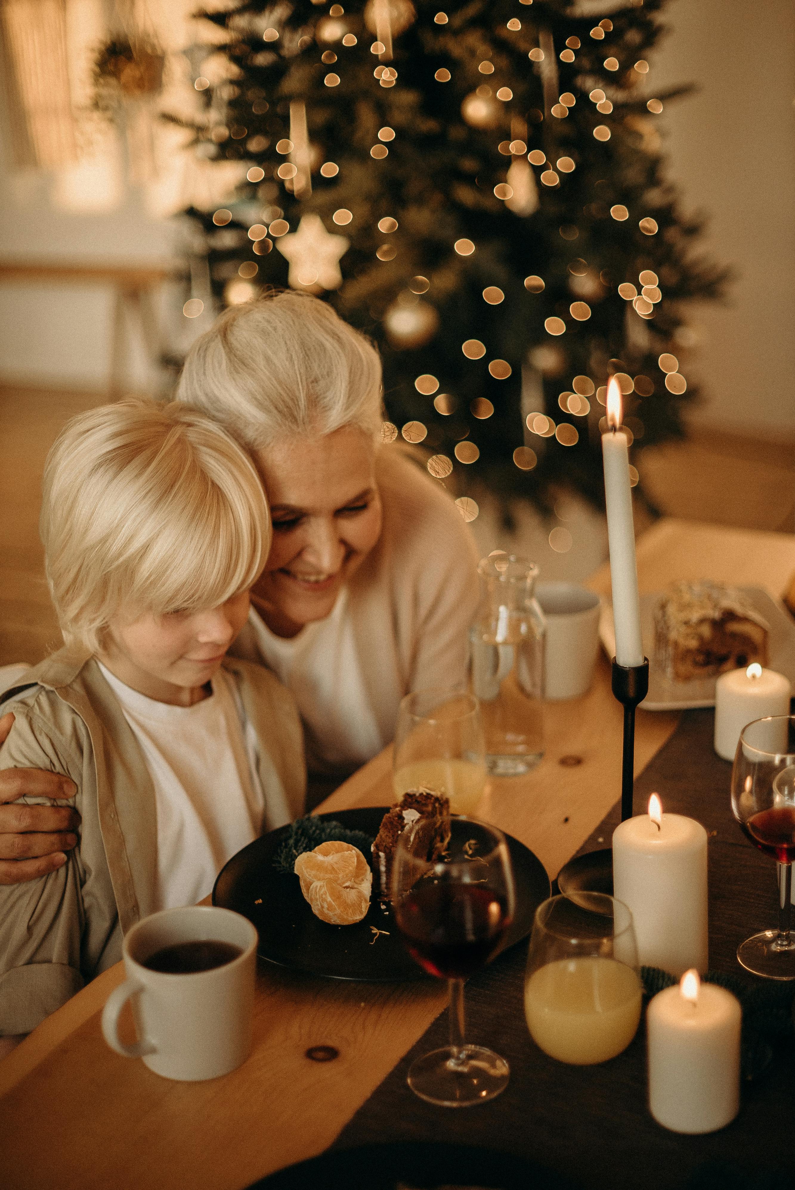 smiling woman beside boy