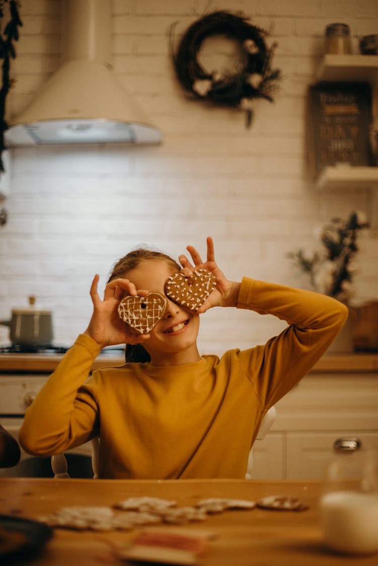 Girl Holding Heart Cookies