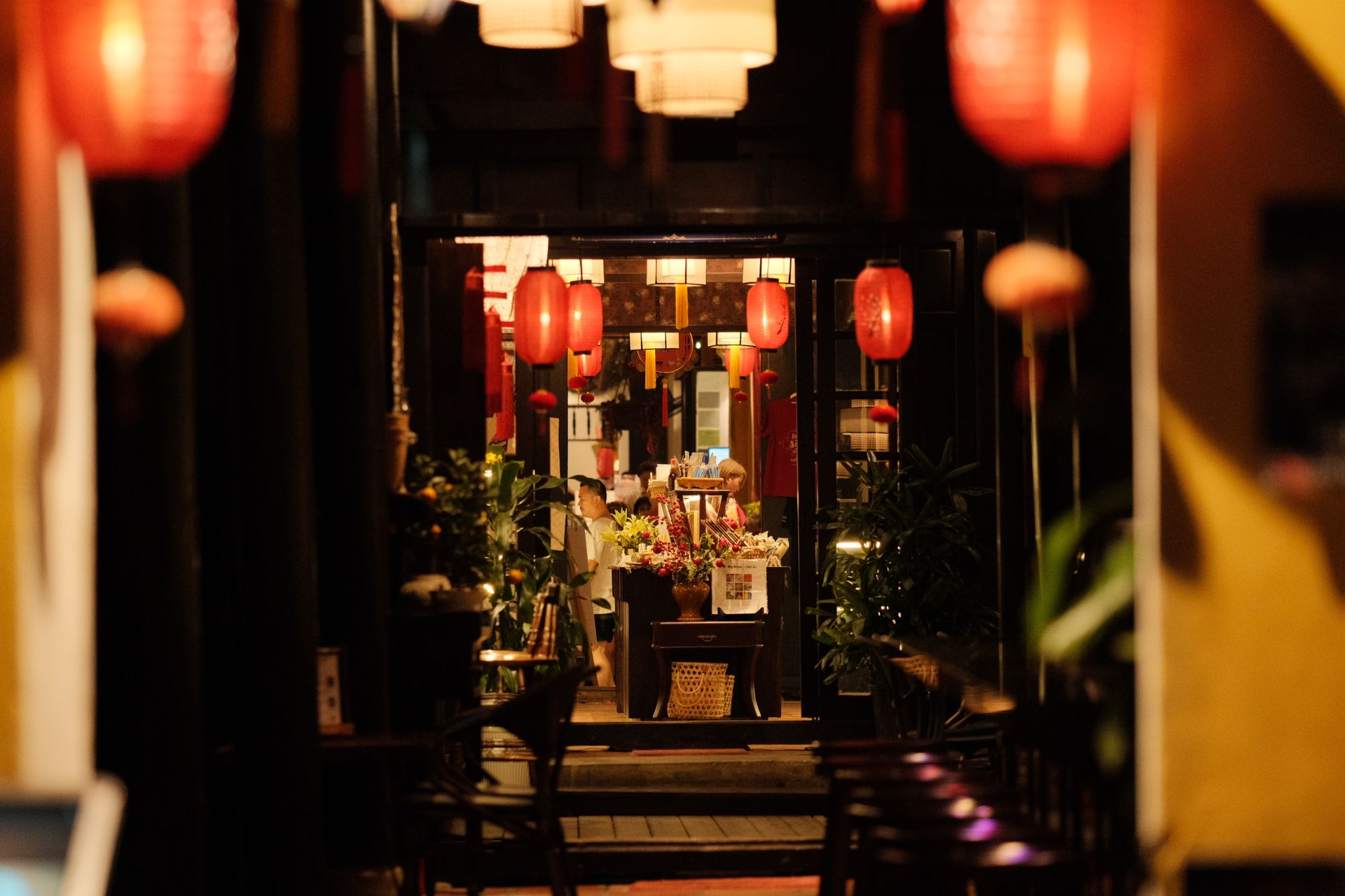 Warm and inviting East Asian restaurant with traditional decor and paper lanterns.