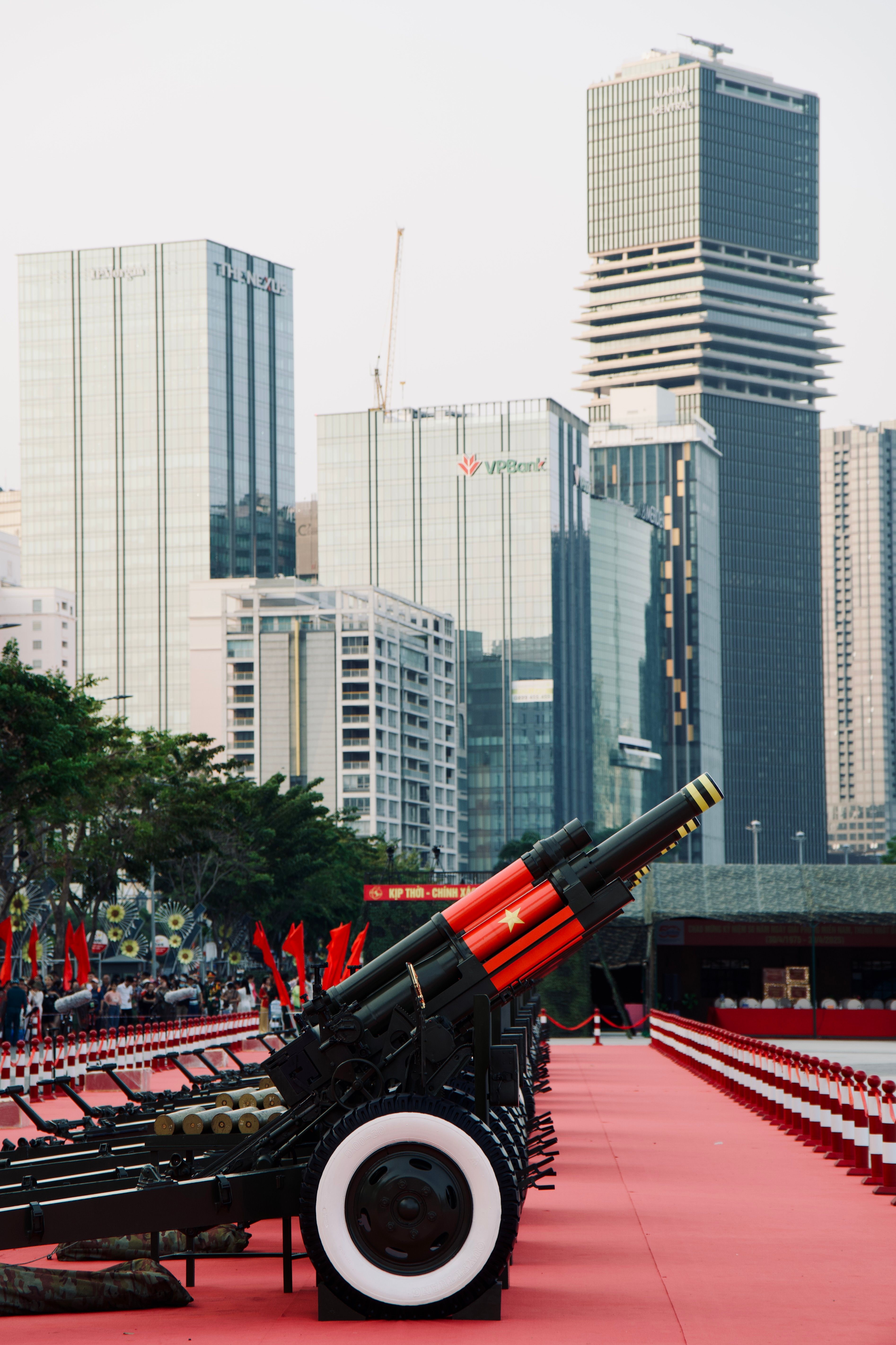 Military Cannons and Skyscrapers Cityscape · Free Stock Photo
