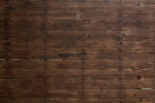 Free Detailed close-up of a rustic wooden wall with nails in Medellín, Colombia. Stock Photo